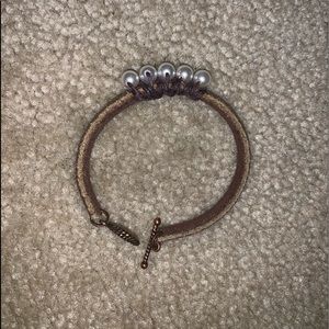brown bracelet with pearls